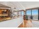 Spacious kitchen with granite countertops, hardwood floors, and a great view of the intercoastal waterway from the breakfast nook at 5950 Pelican Bay S Plz # Ph-2F, Gulfport, FL 33707