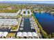 An aerial view of waterfront condominiums with a marina, slips and access to the ocean at 6007 Anchorage Way, St Petersburg, FL 33712