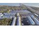 An aerial view of condos with marina and boat slips and neighborhood bay access at 6007 Anchorage Way, St Petersburg, FL 33712