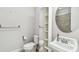 Bathroom with classic fixtures and a built-in linen closet for storage at 6007 Anchorage Way, St Petersburg, FL 33712