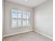 Bright bedroom with neutral carpet, plantation shutters and white trim at 6007 Anchorage Way, St Petersburg, FL 33712