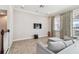 Inviting living room with waterfront views, modern decor, and comfortable seating at 6007 Anchorage Way, St Petersburg, FL 33712