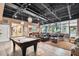 Community lounge with a billiard table, comfortable seating, and a snack bar at 6007 Anchorage Way, St Petersburg, FL 33712
