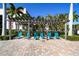 A pergola overlooks lounge chairs at the pool, offering a relaxing shaded area at 6007 Anchorage Way, St Petersburg, FL 33712