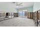 Spacious bedroom with stunning water views and sliding glass doors to a private patio at 673 Boca Ciega Point N Blvd, St Petersburg, FL 33708