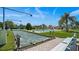 Outdoor recreation area features bocce ball courts and beautifully landscaped grounds at 673 Boca Ciega Point N Blvd, St Petersburg, FL 33708