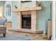 Cozy fireplace with a decorative mantel, creating a warm and inviting atmosphere in the living space at 725 Monte Cristo Blvd, Tierra Verde, FL 33715