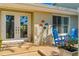 Inviting front porch with bright seating and decorative details, perfect for relaxing at 725 Monte Cristo Blvd, Tierra Verde, FL 33715
