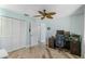Home office with closet, desk, and ceiling fan at 725 Monte Cristo Blvd, Tierra Verde, FL 33715