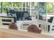 Comfortable outdoor patio area with comfortable seating for outdoor relaxation and entertaining at 725 Monte Cristo Blvd, Tierra Verde, FL 33715