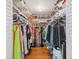 Bright, walk-in closet with ample storage and custom shelving, providing plenty of room for clothes and accessories at 725 Monte Cristo Blvd, Tierra Verde, FL 33715