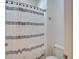 Clean bathroom featuring a bathtub with a shower curtain and a toilet at 729 Winterside Dr, Apollo Beach, FL 33572