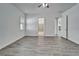 Bright bedroom with sleek floors and open doorways showcasing the home's seamless layout at 729 Winterside Dr, Apollo Beach, FL 33572
