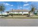 Street view of a single-story home featuring neat landscaping and a well-maintained exterior at 729 Winterside Dr, Apollo Beach, FL 33572