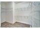 Bright walk-in closet equipped with wire shelving at 729 Winterside Dr, Apollo Beach, FL 33572