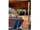 Spacious backyard deck with overhead wood covering and accessibility ramp at 7413 Sherren Dr, Tampa, FL 33619