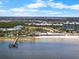 Beautiful aerial view of pier, restaurant, and the beach at 808 Bahia Del Sol Dr # 14, Ruskin, FL 33570