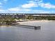 Beautiful aerial view of pier, restaurant, and the beach at 808 Bahia Del Sol Dr # 14, Ruskin, FL 33570