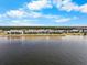 Aerial view of waterfront condos, bay, and lush landscaping at 808 Bahia Del Sol Dr # 14, Ruskin, FL 33570