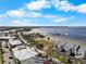 Beautiful aerial shot of waterfront condos, bay, and pier at 808 Bahia Del Sol Dr # 14, Ruskin, FL 33570