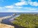Aerial view of waterfront condos with a canal and lush green foliage at 808 Bahia Del Sol Dr # 14, Ruskin, FL 33570