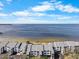 Aerial view of condos, waterfront, and boats on the bay at 808 Bahia Del Sol Dr # 14, Ruskin, FL 33570