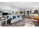 Bright open-concept living room features a view and is open to the dining room at 808 Bahia Del Sol Dr # 14, Ruskin, FL 33570
