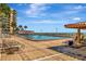 Community pool area with ample seating and access to beach at 880 Mandalay Ave # N907, Clearwater Beach, FL 33767