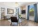 Bright living room featuring a comfy sofa, and large windows at 10405 Villa View Cir # 10405, Tampa, FL 33647