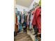 Organized walk-in closet with ample storage space for clothing, shoes, and personal belongings at 10405 Villa View Cir # 10405, Tampa, FL 33647