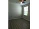 Bedroom featuring a ceiling fan and natural light coming through a window with blinds at 11201 Hudson Hills Ln, Riverview, FL 33579