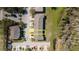 Overhead shot displaying unit location with lush surroundings, parking, and proximity to neighboring residences at 11903 Castine St, New Port Richey, FL 34654
