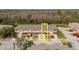 Elevated shot of townhomes showcasing modern exteriors and individual two car garages at 11903 Castine St, New Port Richey, FL 34654