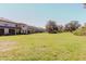 Wide backyard and green space for townhomes, perfect for recreation and relaxation at 11903 Castine St, New Port Richey, FL 34654