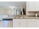 Kitchen view with stainless steel appliances and granite countertops at 11903 Castine St, New Port Richey, FL 34654