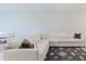 Close up on the living room with a big white sectional couch at 11903 Castine St, New Port Richey, FL 34654