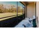 Relaxing screened patio overlooking a grassy area at 11903 Castine St, New Port Richey, FL 34654