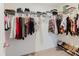 Organized walk-in closet with shelving and hanging rods for ample storage in the home at 11903 Castine St, New Port Richey, FL 34654