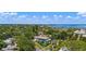 An aerial view of a lovely home surrounded by lush greenery at 1311 Beach Ne Dr, St Petersburg, FL 33701