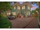 An inviting backyard featuring a brick patio with a outdoor grill and seating area for entertaining at 1311 Beach Ne Dr, St Petersburg, FL 33701