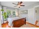 Charming bedroom with hardwood floors, and large windows allowing natural light at 1311 Beach Ne Dr, St Petersburg, FL 33701