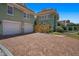 Charming home showcasing a brick driveway and a well-maintained two-car garage, enhancing curb appeal at 1311 Beach Ne Dr, St Petersburg, FL 33701