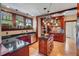 Stylish kitchen with granite counters, stainless steel appliances, custom cabinets, and a center island at 1311 Beach Ne Dr, St Petersburg, FL 33701