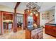 Spacious kitchen with custom cabinets, stainless appliances, granite countertops, and access to other rooms at 1311 Beach Ne Dr, St Petersburg, FL 33701