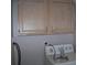 Laundry room featuring a white washing machine and dryer at 1554 Tilley Ave, Clearwater, FL 33756