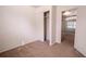 Bedroom featuring a closet with a door and neutral carpeting, providing ample storage at 1800 27Th N Ave, St Petersburg, FL 33713