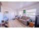 Cozy living room with tile flooring, furniture, and natural light at 1800 27Th N Ave, St Petersburg, FL 33713