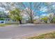 Street view featuring house number #1 and #2 and mature trees at 1800 27Th N Ave, St Petersburg, FL 33713