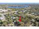 Bird's-eye view of the home's location within a neighborhood setting near a lake and roadways at 223 33Rd N Ave, St Petersburg, FL 33704