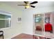 Bonus Room featuring a ceiling fan and sliding glass door at 3018 Highland N St, St Petersburg, FL 33704